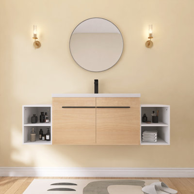 Meuble-lavabo mural Bromthor 60 po avec lavabo en résine, deux tablettes de rangement ouvertes, hauteur réglable, poignées en métal noir, portes à fermeture amortie, finition chêne naturel