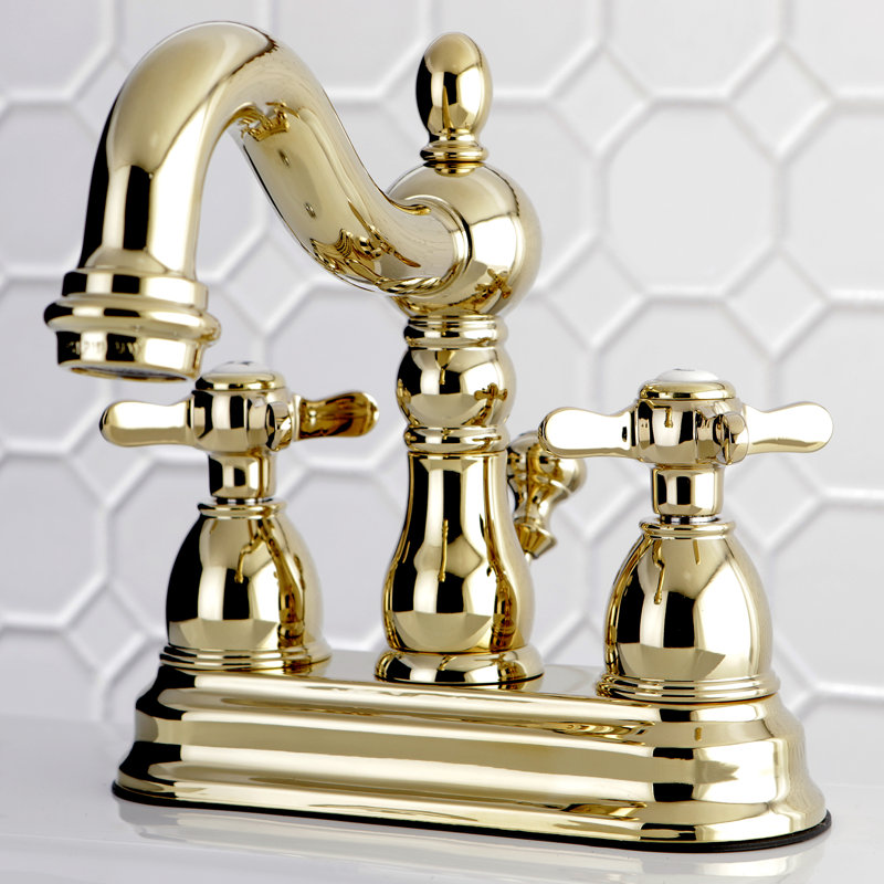 Kingston Brass Essex Two-Handle 3-Hole Deck Mount 4" Centerset Bathroom Faucet with Plastic Pop-Up, Polished Brass