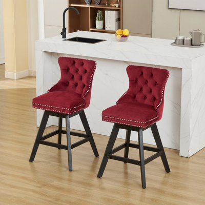 Tabouret de bar pivotant en velours capitonné