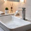 Robinet de lavabo de salle de bain à poignée simple en nickel brossé avec flux laminaire