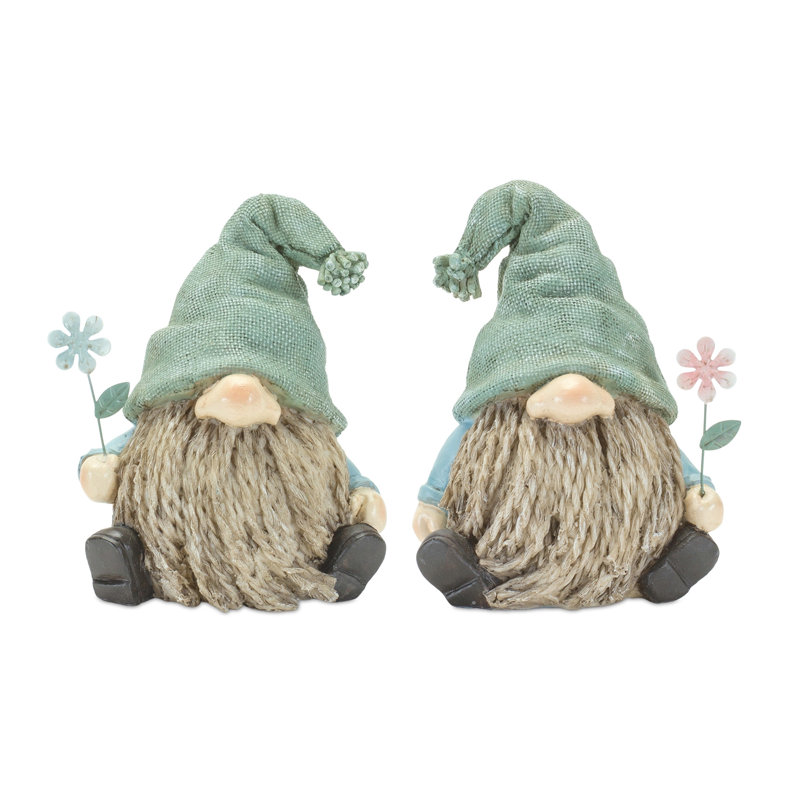 Ensemble de quatre gnomes en polyrésine brune et verte