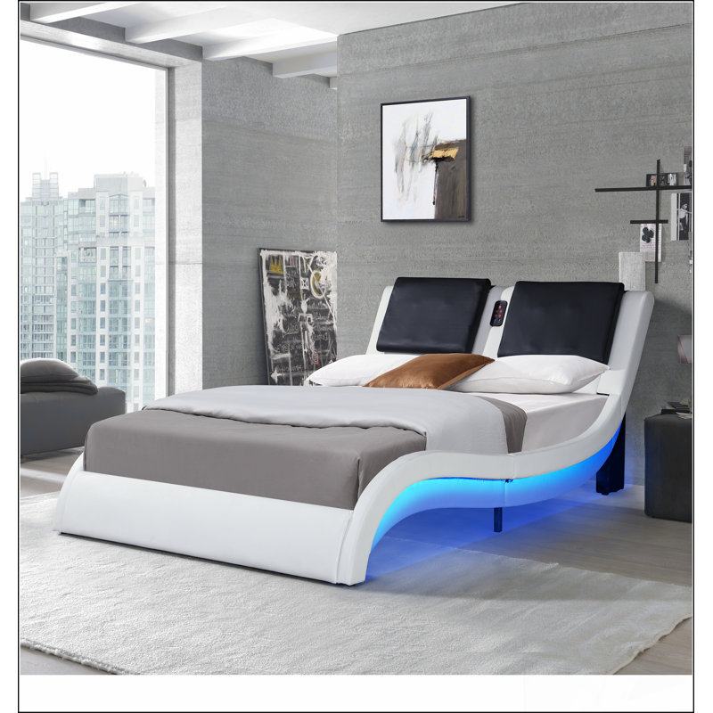 Structure de lit tapissier en similicuir avec éclairage à DEL, audio Bluetooth, massage du dossier et conception élégante en courbe
