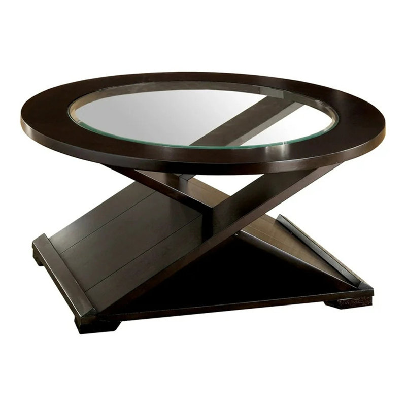 Table basse d'appoint de style contemporain avec base unique en forme de croix et plateau en verre de 5 mm soutenu par une structure en bois massif au fini espresso