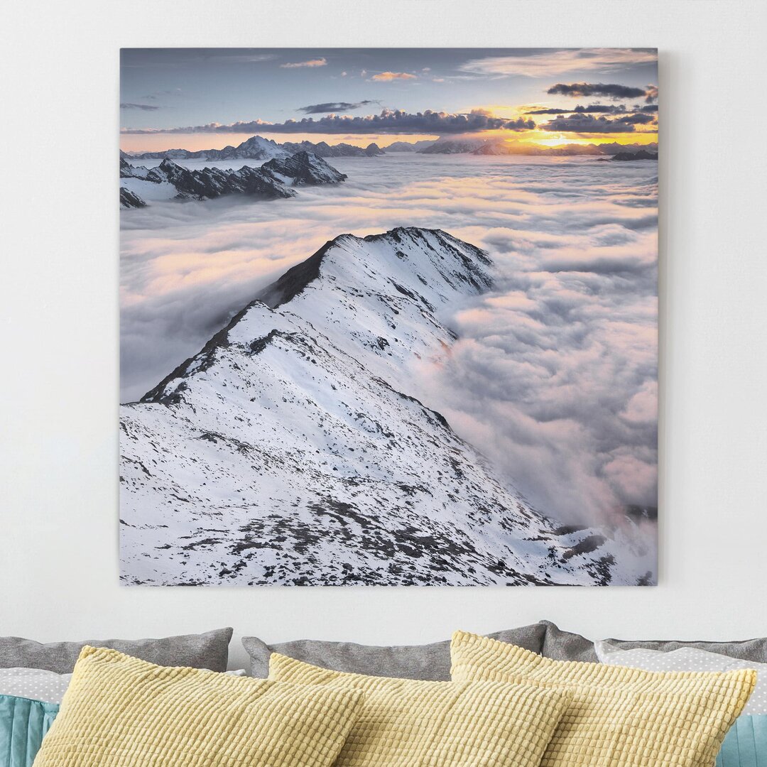 Leinwandbild Blick über Wolken und Berge