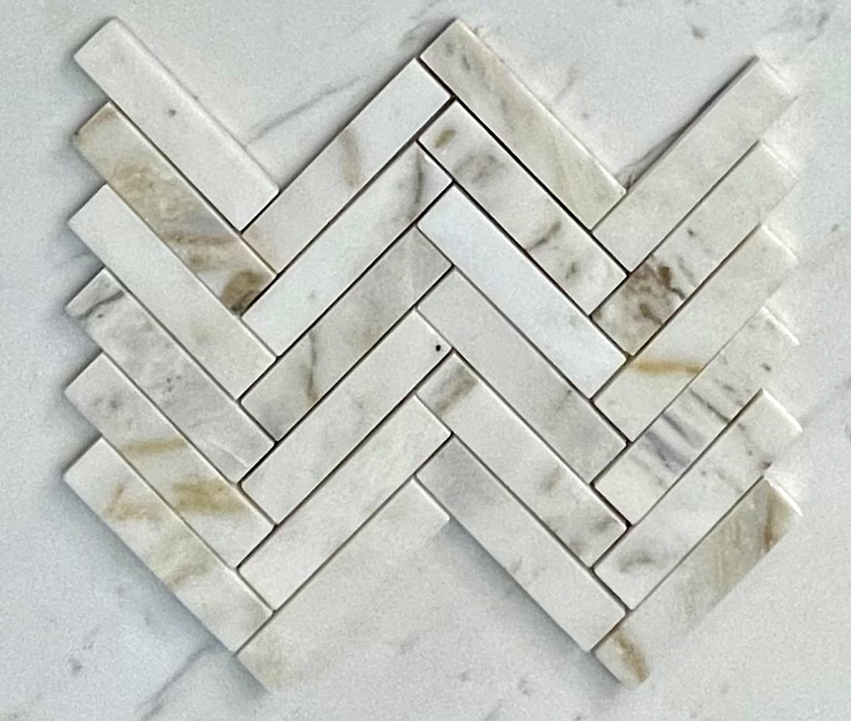 Tileville Calacatta Gold 1" x 4" Marble Natural Stone Herringbone ...