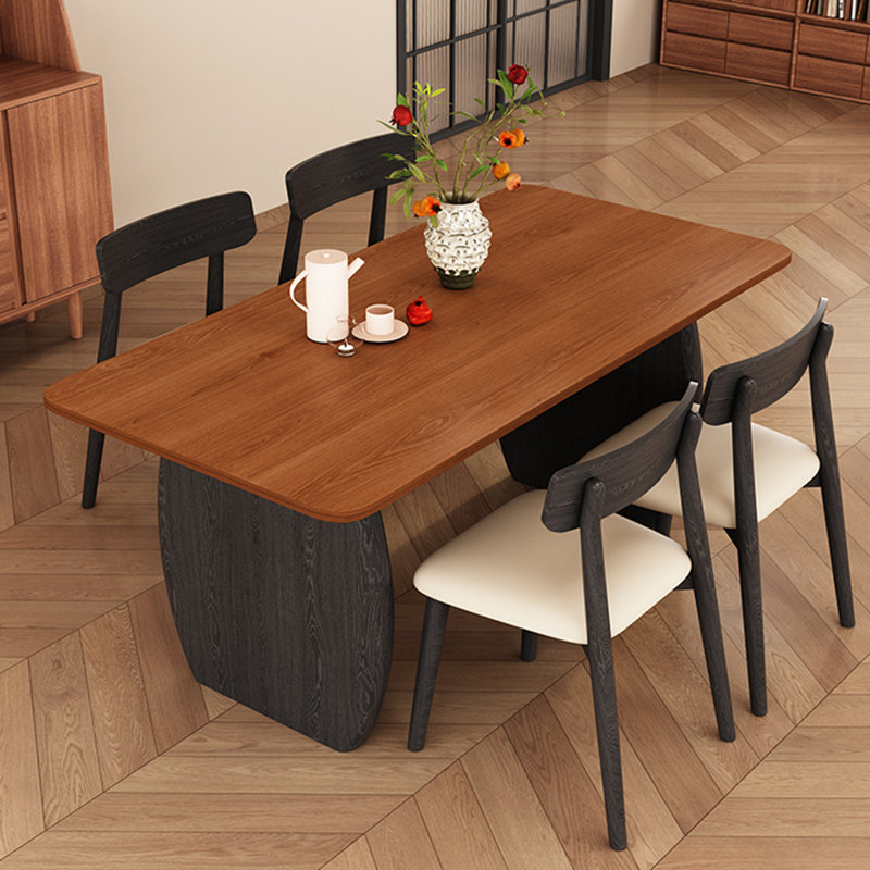 The solid wood dining table is simple yet elegant, 29.52"H x 55.11"L x 31.49"W