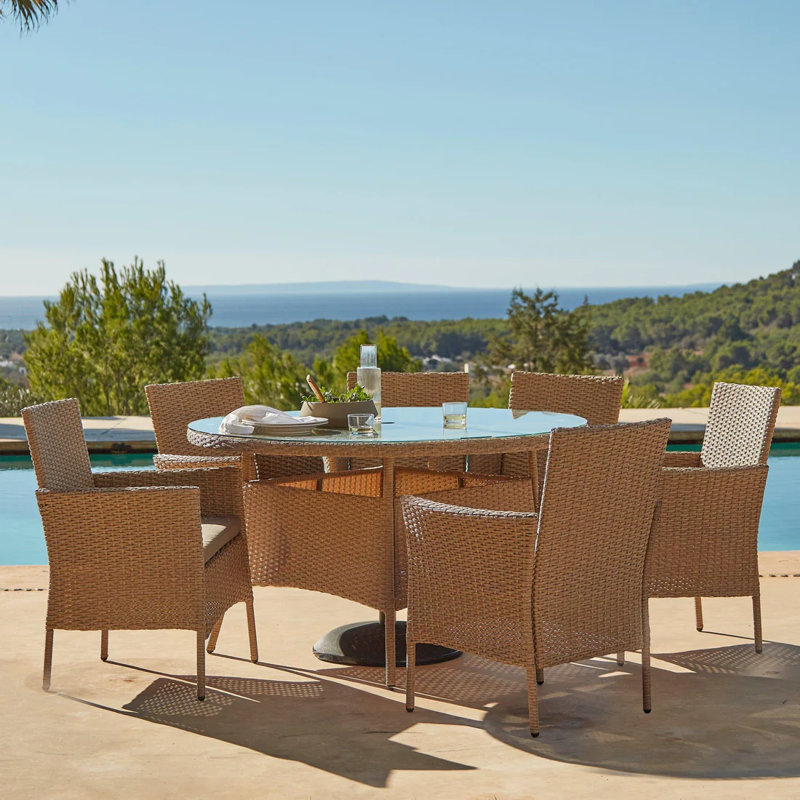 Dubose 6 - Person Wicker Patio Dining Set with Round Table , Cushions Included, Brown, No