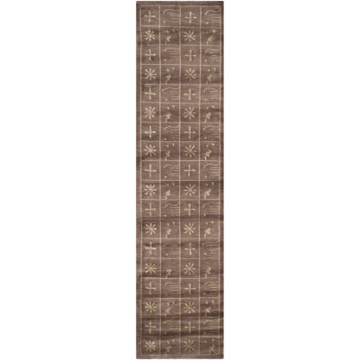 Tibetan Plum Pictogram Brown Area Rug