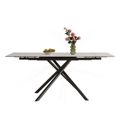 Table de salle à manger rétractable en pierre frittée, de conception rectangulaire moderne, avec des pieds en acier au carbone noir au bas, 83 pouces convenant à 6 à 8 sièges (blanc)