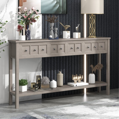 Longue console avec quatre tiroirs et une tablette ouverte