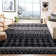 Tapis noir à motif géométrique Cobos