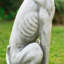 Statue de jardin chien assis