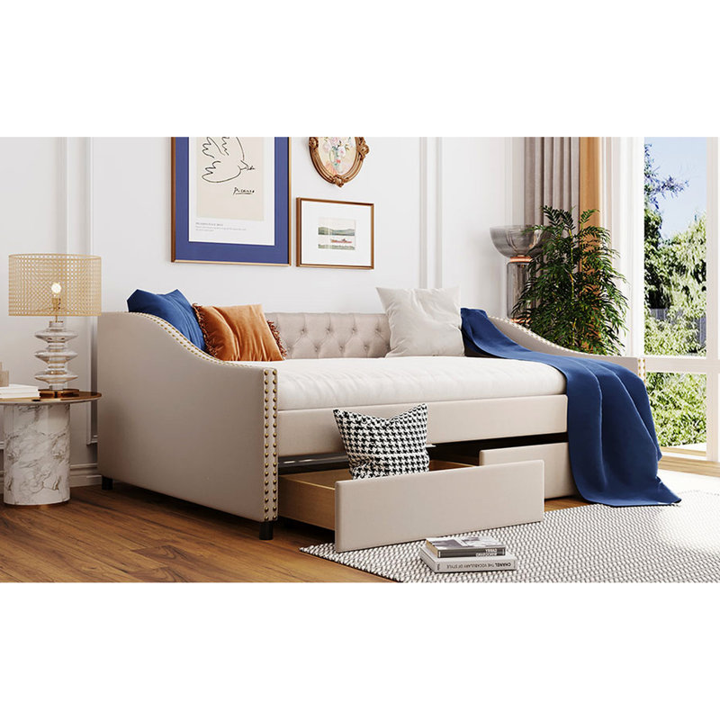Lit de jour rembourré beige avec deux tiroirs pratiques et un cadre en lattes de bois robuste - Créez un espace de vie confortable, un support stable et spacieux transformant le décor de votre chambre à coucher