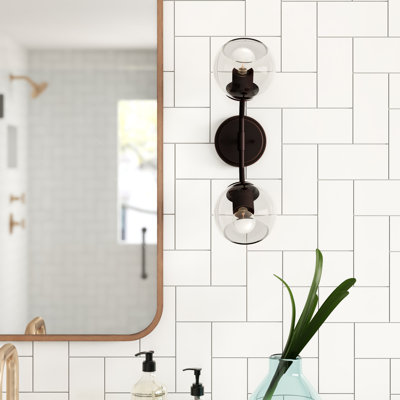 Dashly Stainless Steel Armed Sconce