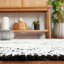 Tapis floral noir / ivoire en coton et coton touffeté à la main Chrishaunda-1071194483