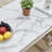 Skailar Pedestal Coffee Table,Faux Marble Top Metal Base-61140935-61140934