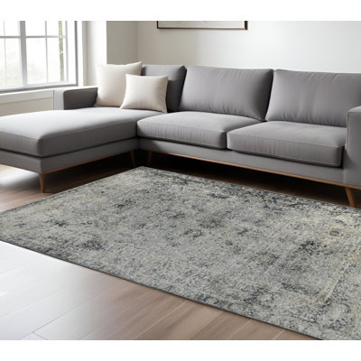 Tapis médaillon floral gris et noir 8 pi x 11 pi