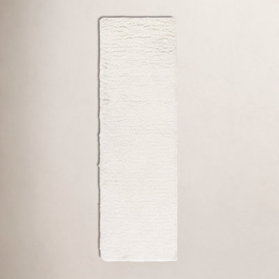 Abriel Ivory Solid Hand-Woven Wool Rug