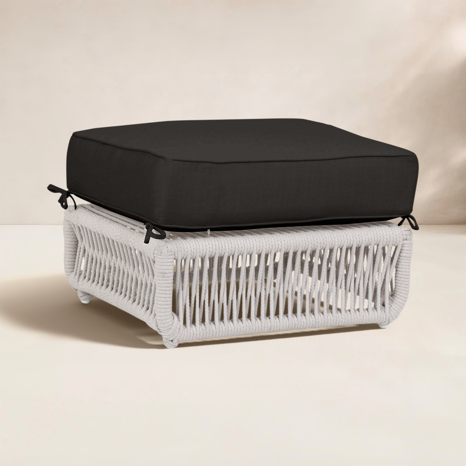Lucan Wicker Outdoor Ottoman with Sunbrella® Cushion, Spectrum Carbon Sunbrella® Plainweave
