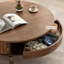 Table basse ronde avec porte roulante