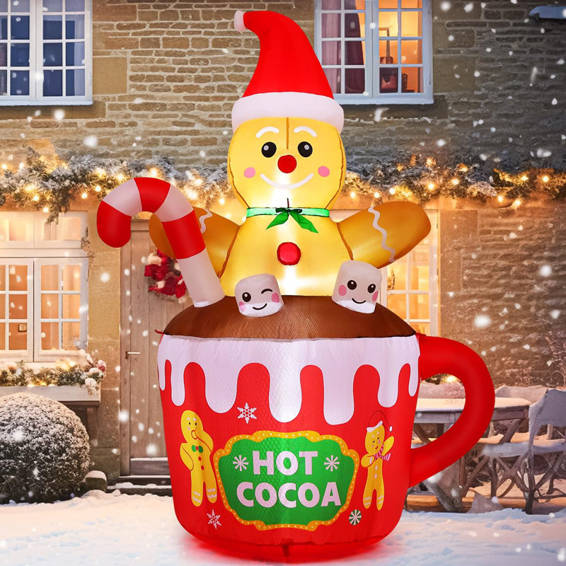 Bonhomme de pain gonflable de Noël de 6 pi GOOSH assis dans une tasse de cacao chaud avec des DEL intégrées