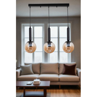 Luminaire de lustre noir et miel élégant | Corps en métal avec capuchon en verre, hauteur réglable | Plaque de base 21,7 x 2,4 x 1,2 pouces | 3 x douilles E27 (40 W maximum, ampoule non incluse) |  pour les salles à manger et les espaces de vie