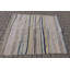 Tapis turc rayé tissé à la main dans des tons pastel, parfait pour un décor bohème dans les salons et comme tapis de sol