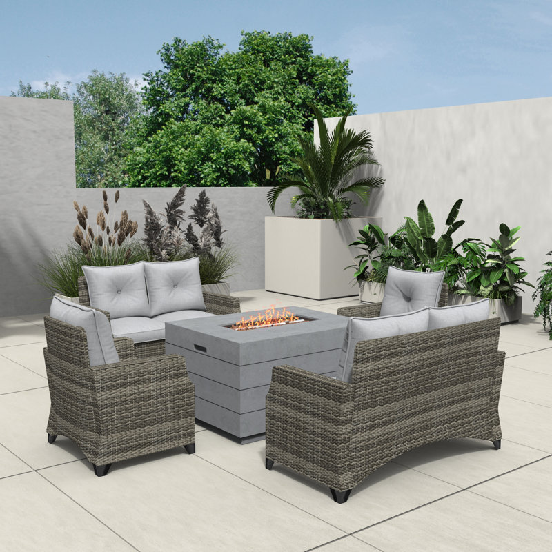 Schwerin Wicker 6 - Person Patio Conversation Set with Cushions