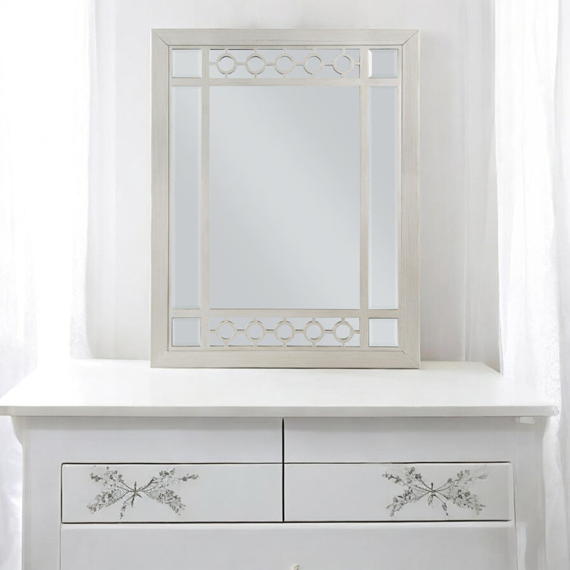 Miroir mural argenté à finition miroir avec cadre géométrique surélevé, polyvalent pour le salon
