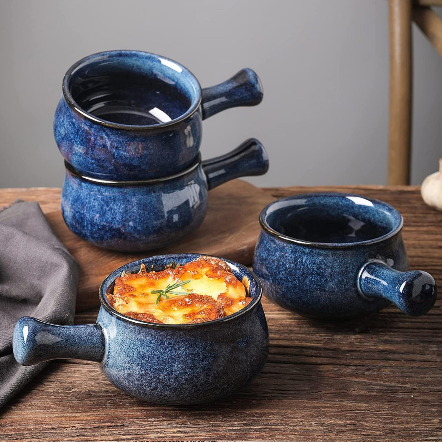 https://assets.wfcdn.com/im/69150391/compr-r85/2366/236654964/26-oz-blue-french-onion-soup-bowls-with-handles-set-of-4.jpg