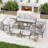 7-Piece Aluminum Patio Conversation Set With Coffee Table, End Table, Ottomans And Light Gray Cushions
