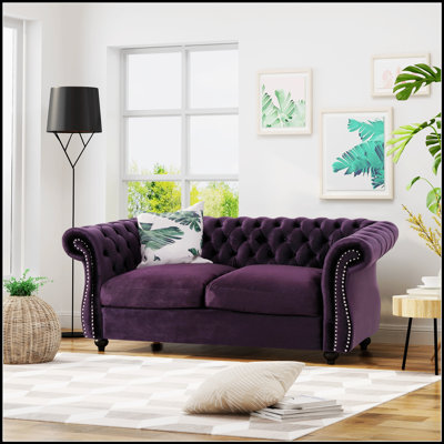 Canapé Chesterfield classique avec capitonnage à boutons profonds et détails cloutés pour une élégance et un confort intemporels
