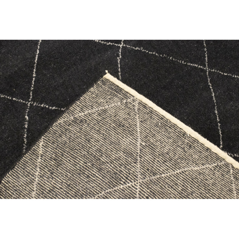 Tapis rectangulaire noir / blanc en laine noué à la main à motif géométrique