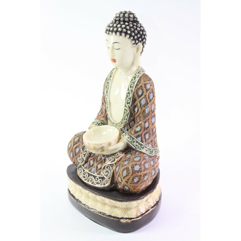 Bouddha brun Kasaya tenant une bougie chauffe-plat