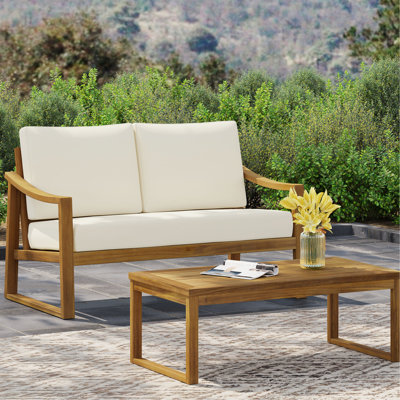 Table basse en bois et coussins d'eau avec lattes à lamelles de 28,5 po de largeur pour les coussins d'extérieur avec espaces design