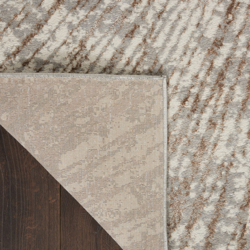 Gray and Gold Abstract 8' x 10' Synthetic Area Rug