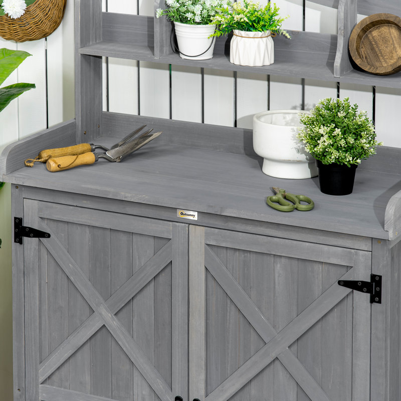 Table de rempotage Outsunny, armoire de rangement extérieure, banc de jardinage multifonctionnel, poste de travail en bois avec portes magnétiques, pour outils de jardin ou accessoires de piscine, gris