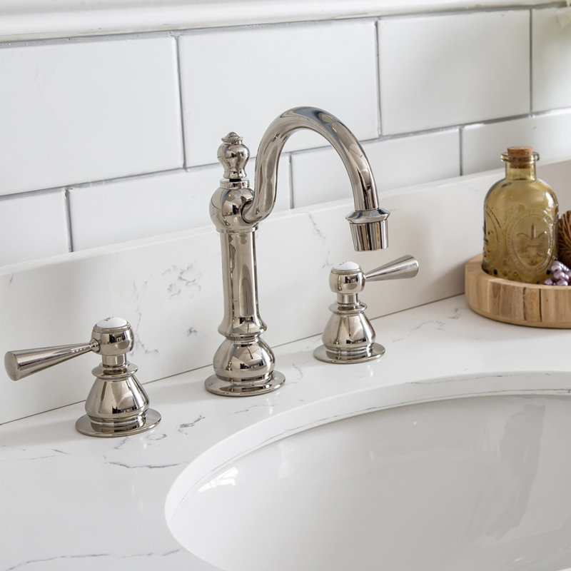 Robinet de lavabo américain à fixation sur le comptoir avec drain escamotable et finition en nickel poli avec poignées leviers en métal, indice de chaleur et de froid inclus