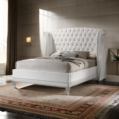 McManus Upholstered Wingback Bed