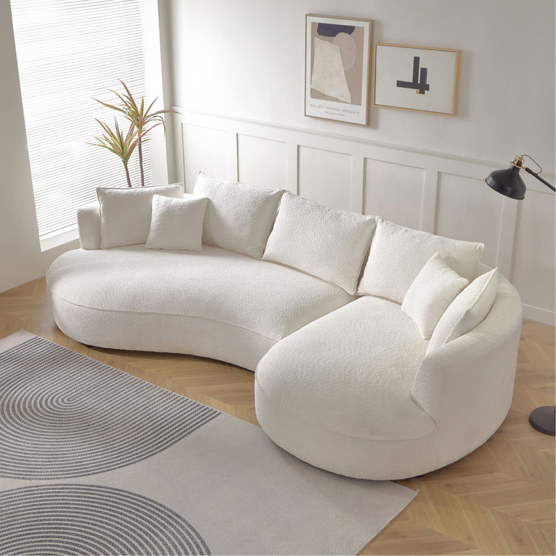 Canapé courbé de forme ingénieuse beige