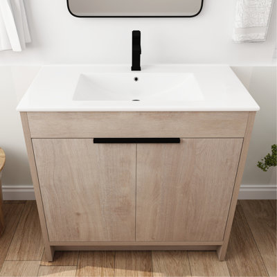 Meuble-lavabo autoportant 36 po. Lavabo en céramique blanche et 2 portes avec fonction de fermeture en douceur. Éclairage en chêne clair. Tablette réglable. Poignées en métal. Armoire à pharmacie en coquille de contreplaqué 36 po. Armoire à pharmacie