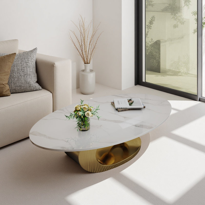 Table basse en marbre avec base sculpturale en acier inoxydable, Doré