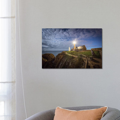 The Lighthouse Under The Sky by Philippe Manguin - Wrapped Canvas Print