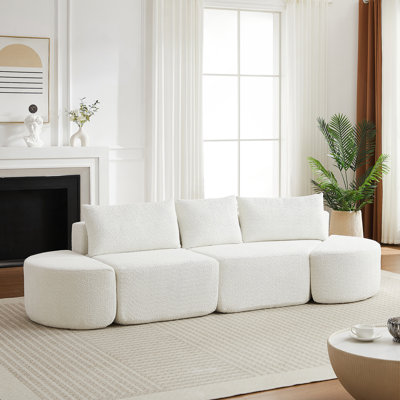 Ensemble de canapé modulaire en V de 106,3 pouces avec tissu en chenille, coussins décoratifs et repose-pieds incurvés pour des sièges polyvalents.