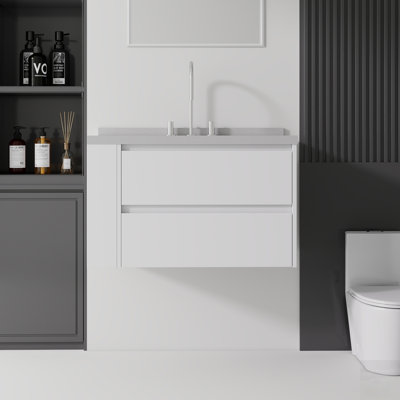 Meuble-lavabo flottant avec lavabo, porte à fermeture douce et comptoir en marbre de culture durable, idéal pour les espaces compacts et le design moderne