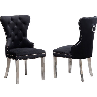 Black Contemporary Velvet Chair  2Pcs . Button With Decorative Ring Back. Nailhead Trim. Solid Wood Frame & Sleek Stainless Steel Legs. 22"W X 25.63"D 40.93"H. Seat: 21.5"W 19"D 20"H Stable Base