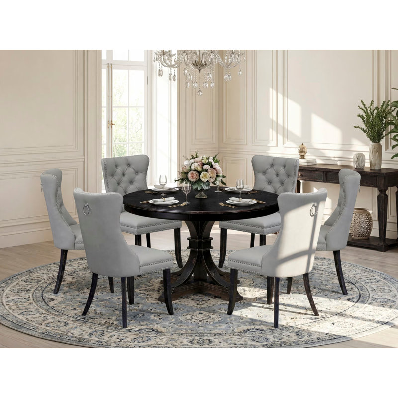 Ensemble de table de salle à manger 7 pièces composé d'une table ronde de 48 po avec piédestal et 6 chaises rembourrées en polyester gris clair, noir sablé