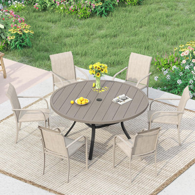 6-Person Patio dining set with Round Dining Table and 6 Stackable Armrest Chairs