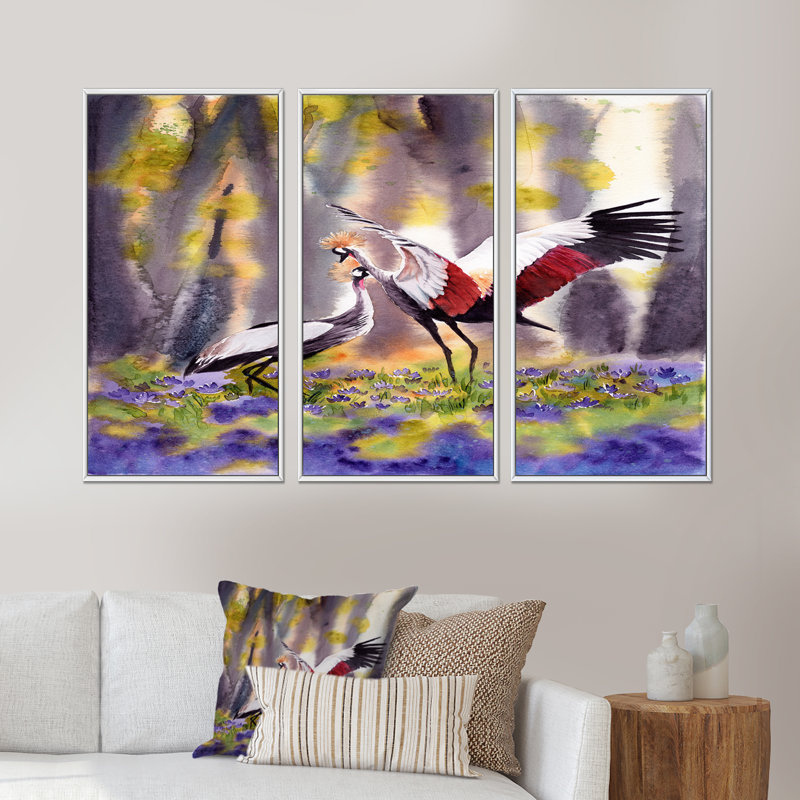 Deux grues couronnées dansant dans une clairière ensoleillée - ensemble d'art mural sur toile traditionnel encadré de 3