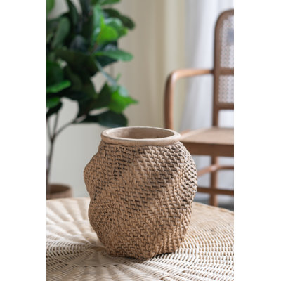 Pot décoratif décoratif sable et ciment brun avec motif tissé complexe